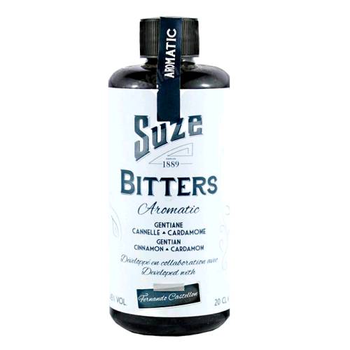 Suze Aromatic bitters in dark in color and made with gentian and cinnamon spices and cardamom seads.