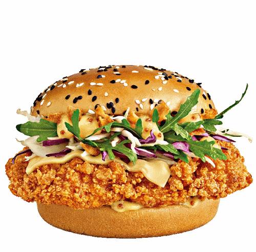 Honey Chicken Burger made with a crispy chicken mixed salad and spicy sauce honey on a seed bun.
