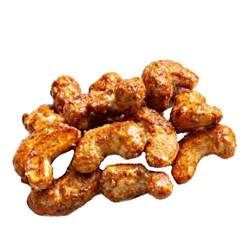 Cashew candied after cleaning and toasting nuts then coated in a sweet sugar.