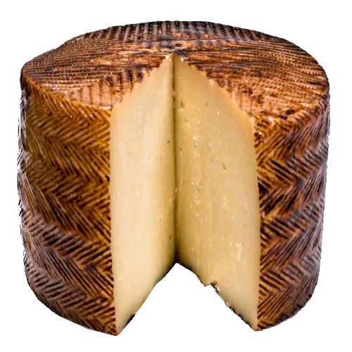 Cheese Manchego - Manchego Cheese that is made from sheeps milk is a pale white to yellow with hard a texture and is slightly sharp and sweet taste.