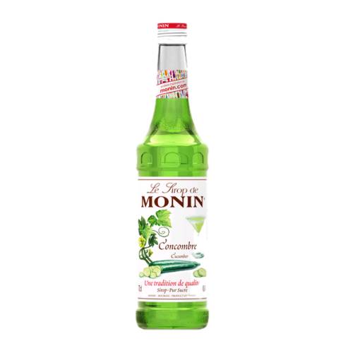 Monin cucumber syrup with a light green color.