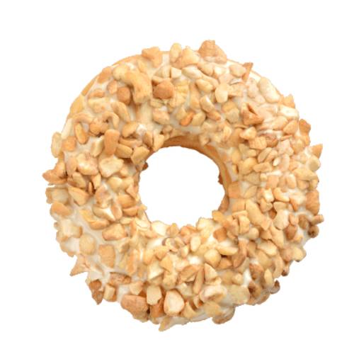Macadamia doughnut cooked into a ring and made with macadamia meal flour and coared with overn toated with crushed macadamia kibble.