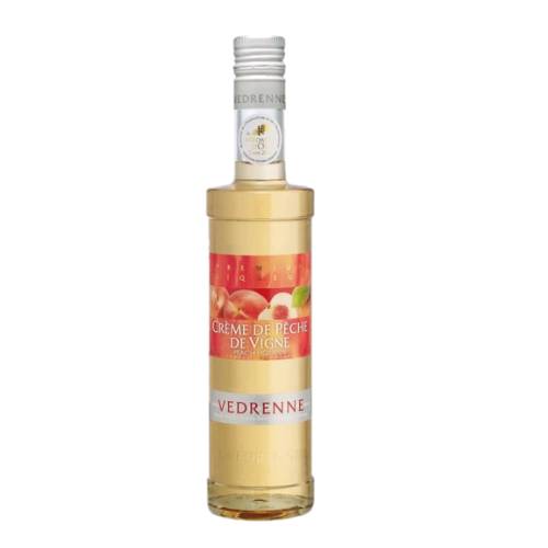 Peach Liqueur Vedrenne - Vedrenne Peach Liqueur also called Creme de Peche de Vigne golden and slightly pinkish very aromatic sugary fruit flesh and juice and generous taste of fully mature fruit