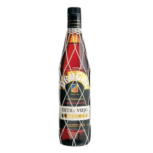 Rum Brugal Extra Viejo - Brugal Extra Viejo Rum with smooth to the nose with aromatic nuances and a light woodiness. Its aroma is a mixture of honey and fruits with traces of caramel.