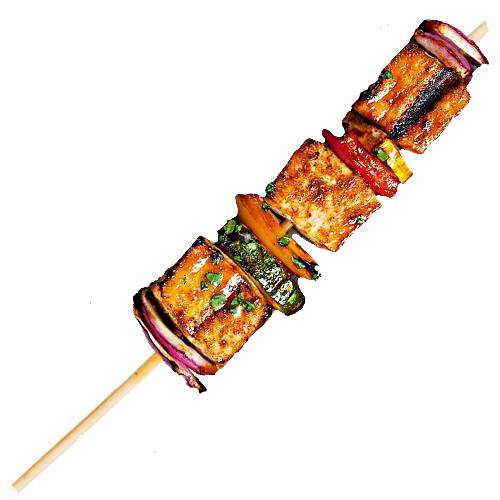 Tofu Skewer is tofu and mixed veg cooked on a BBQ skewer stick.