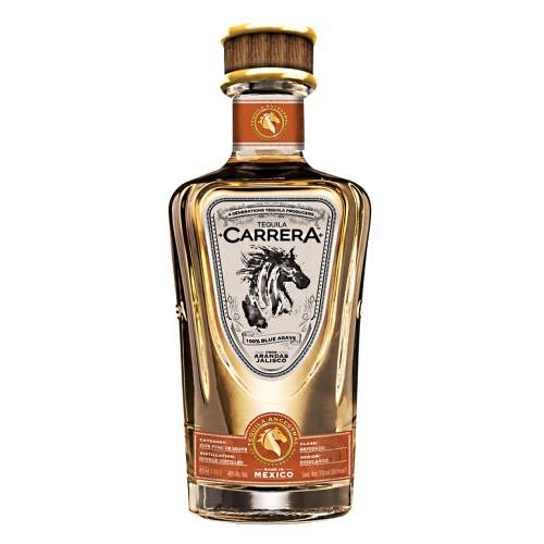 Carrera reposado tequila conserving the traditional of making tequila with its light golden glow the reposado has a soft vanilla aroma with cooked agave and bananas.
