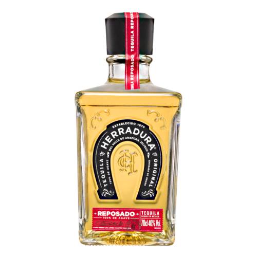 Tequila Reposado Herradura - Herradura reposado tequila is aged in oak barrels for 11 months giving the tequila a beautiful balance of cooked agave sweet oaky vanilla and cinnamon.