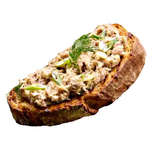 Crab Rillette Toast is melba toast topped with mixed cab meat and salad greens.